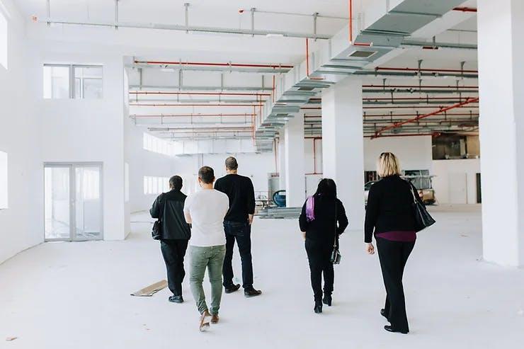 People walking on a construction site